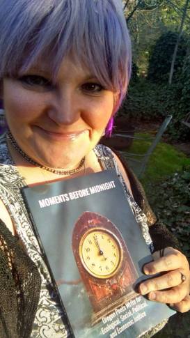 Ariel with poetry anthology Moments Before Midnight